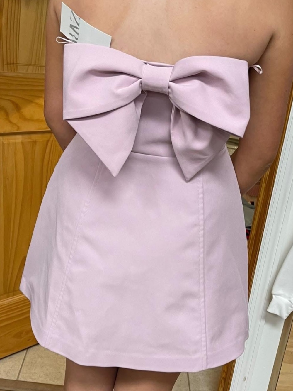 Zara Strapless Mini Dress in Light Pink with Oversized Back Bow